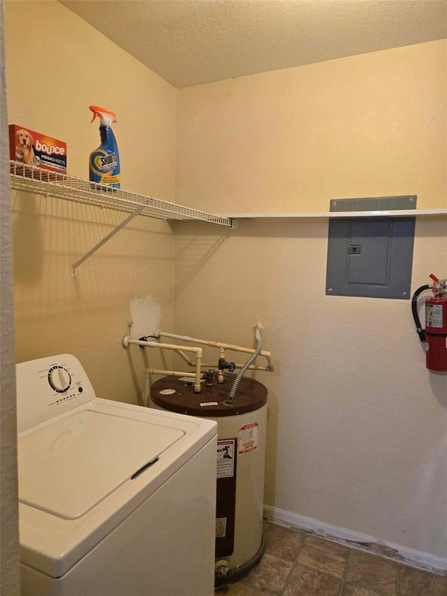 laundry room with washer / dryer, electric panel, a textured ceiling, and water heater