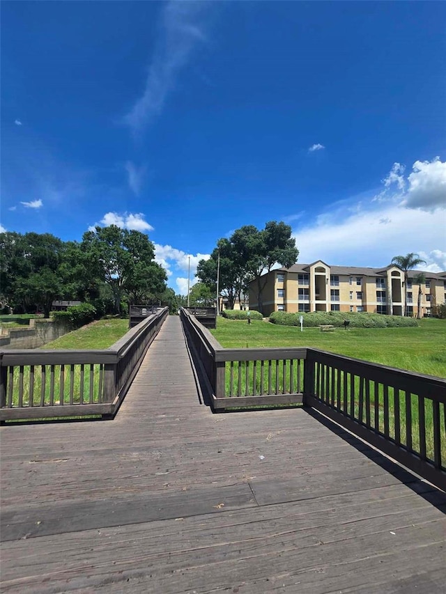 deck featuring a lawn