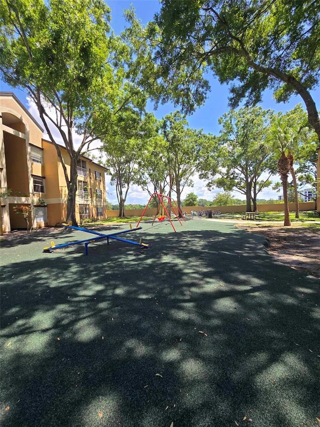 surrounding community featuring a playground