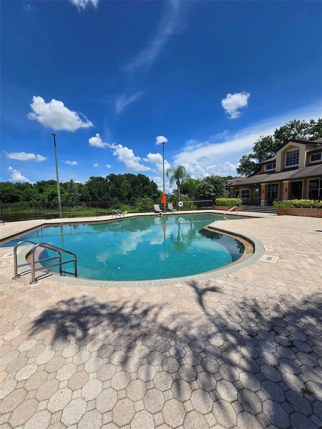 view of pool with a patio area