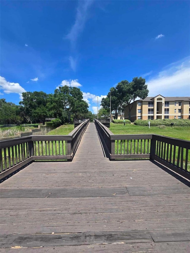 wooden deck with a yard