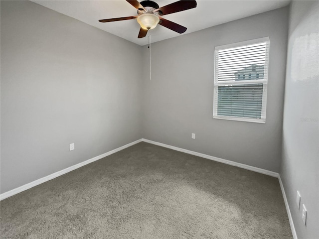 unfurnished room featuring carpet flooring and ceiling fan