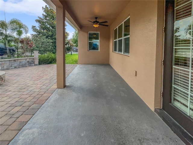 view of patio / terrace featuring ceiling fan