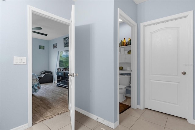 hallway with light tile patterned floors