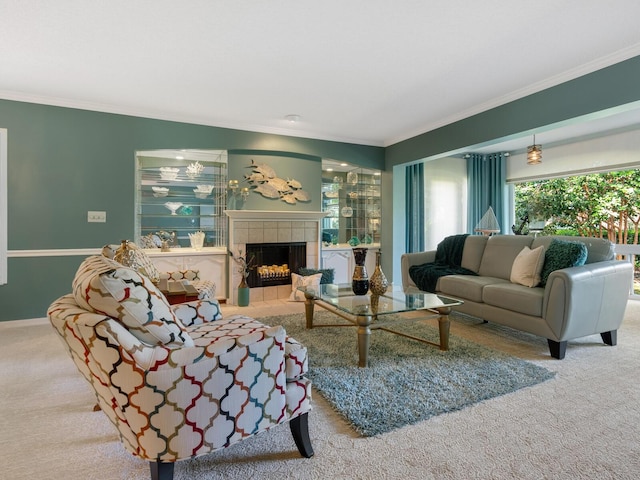 carpeted living area featuring ornamental molding, a tile fireplace, and baseboards