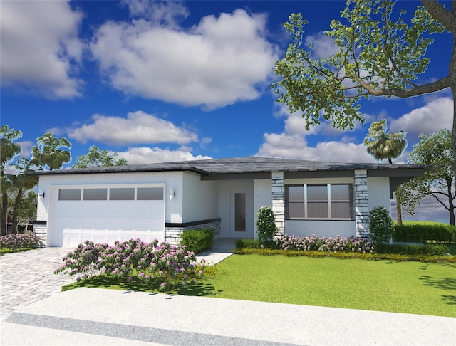 view of front of house featuring a garage and a front lawn