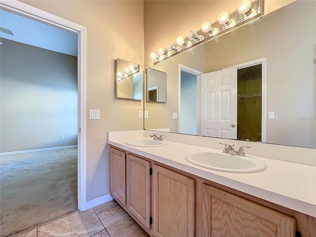 bathroom featuring vanity and tile patterned flooring