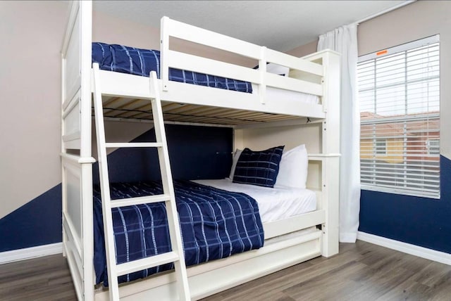 bedroom featuring hardwood / wood-style flooring