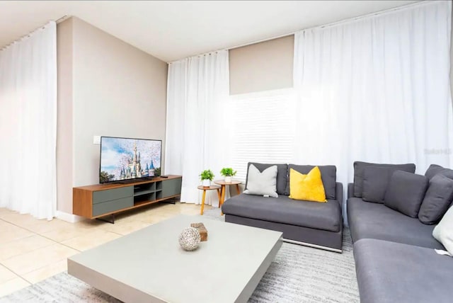 living room featuring light tile patterned flooring