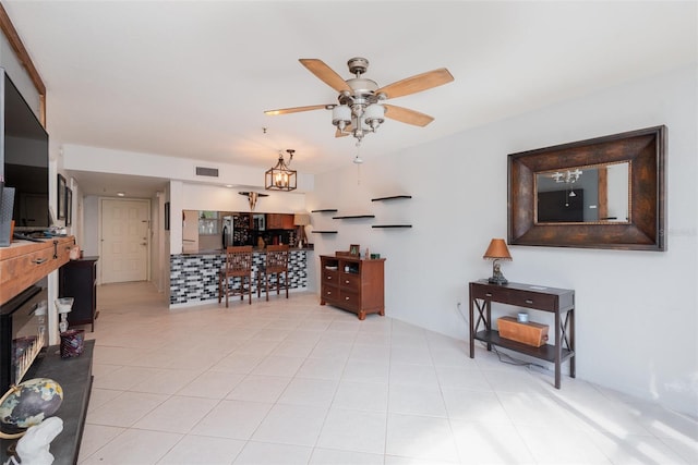 living room featuring ceiling fan