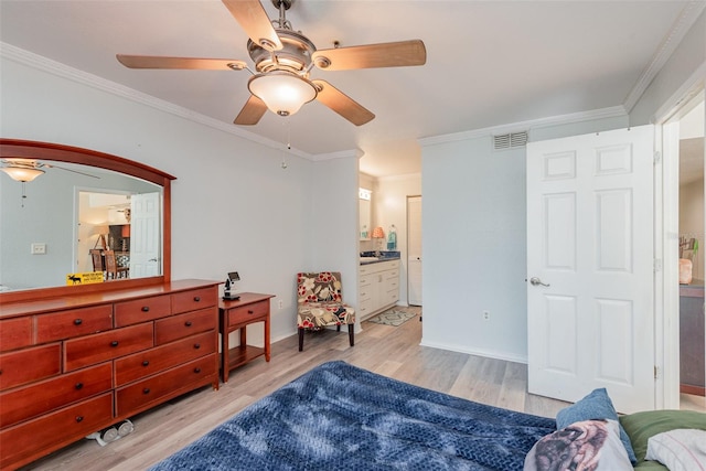 bedroom featuring ceiling fan, ensuite bathroom, crown molding, and light hardwood / wood-style floors