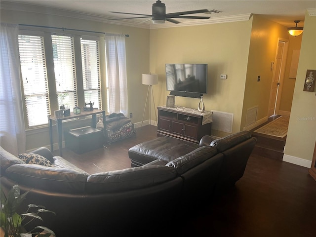 living room with crown molding, ceiling fan, and wood-type flooring