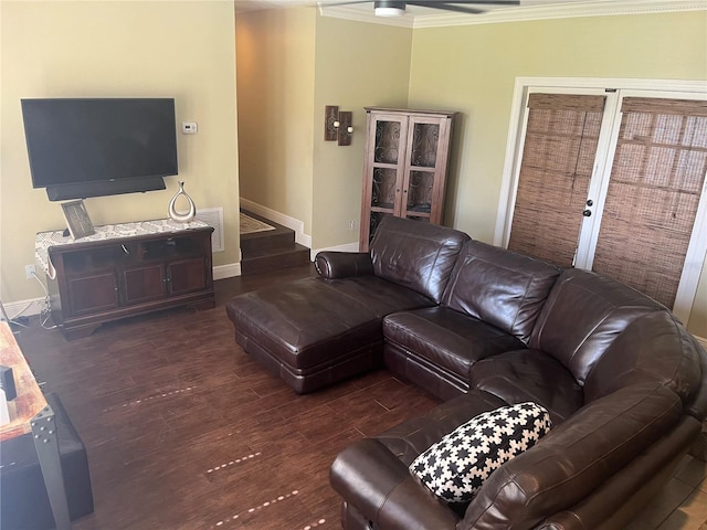 living room with crown molding and dark hardwood / wood-style floors