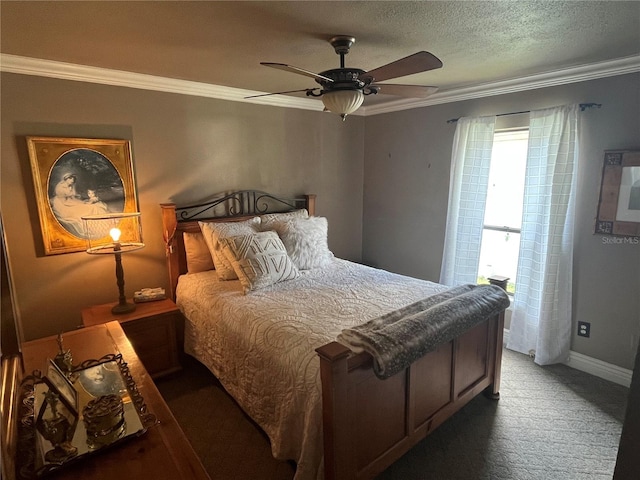 bedroom with ceiling fan, ornamental molding, and a textured ceiling