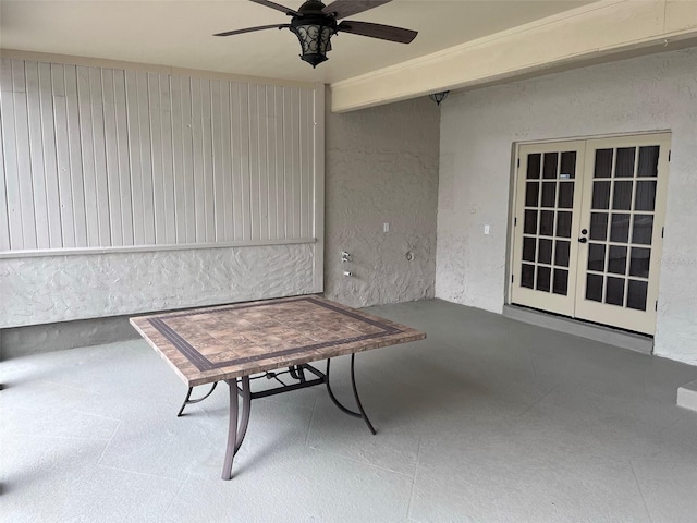 view of patio / terrace with ceiling fan and french doors