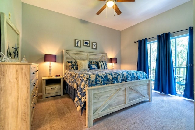 bedroom with access to exterior, light colored carpet, and ceiling fan