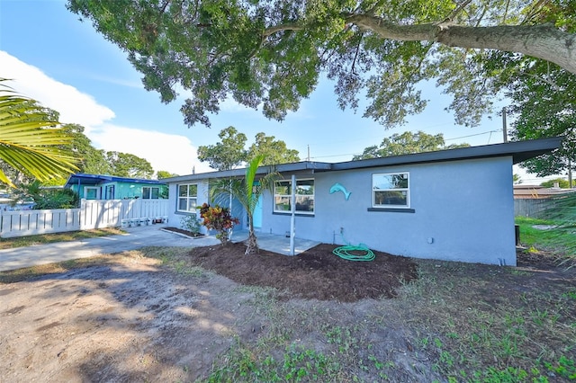 view of front of house with a patio