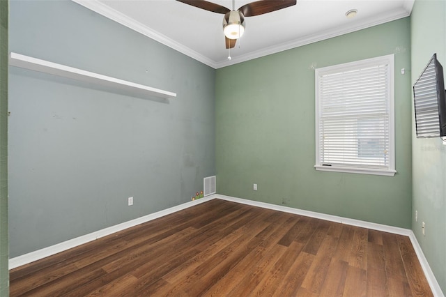 unfurnished room with ceiling fan, dark wood-type flooring, and crown molding