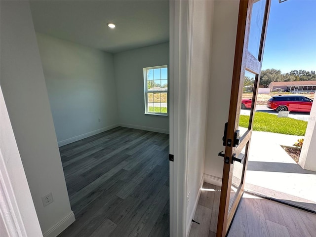 interior space with hardwood / wood-style floors