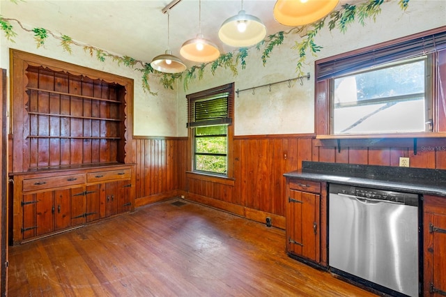 kitchen featuring dark hardwood / wood-style flooring, decorative light fixtures, and dishwasher