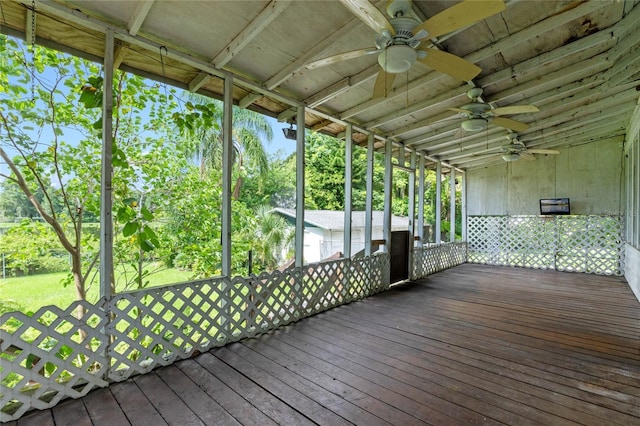 wooden terrace featuring ceiling fan