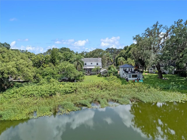 drone / aerial view with a water view