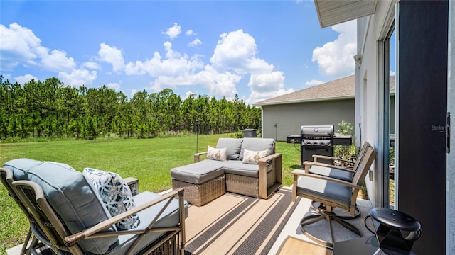 exterior space with outdoor lounge area and a grill