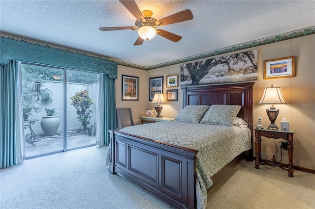 bedroom with ceiling fan, a textured ceiling, access to outside, and light carpet