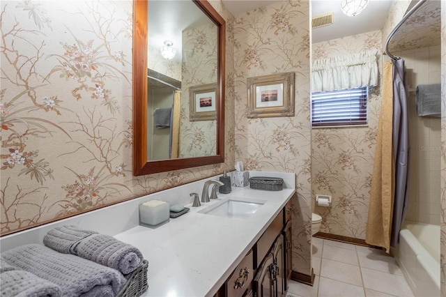 full bathroom with toilet, shower / tub combo, vanity, and tile patterned floors