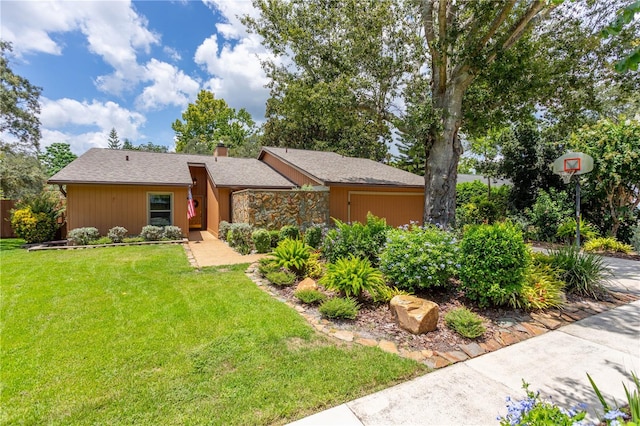 ranch-style house featuring a front lawn