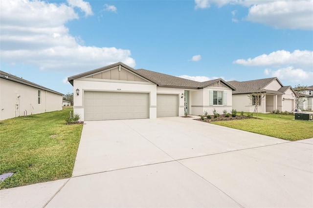 ranch-style house featuring a front lawn and a garage