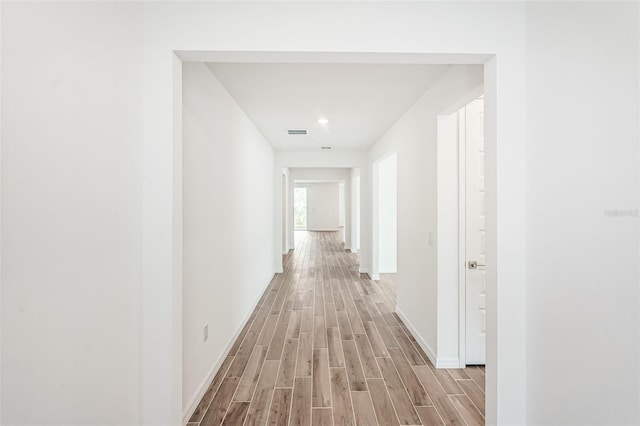 hallway featuring light wood-type flooring