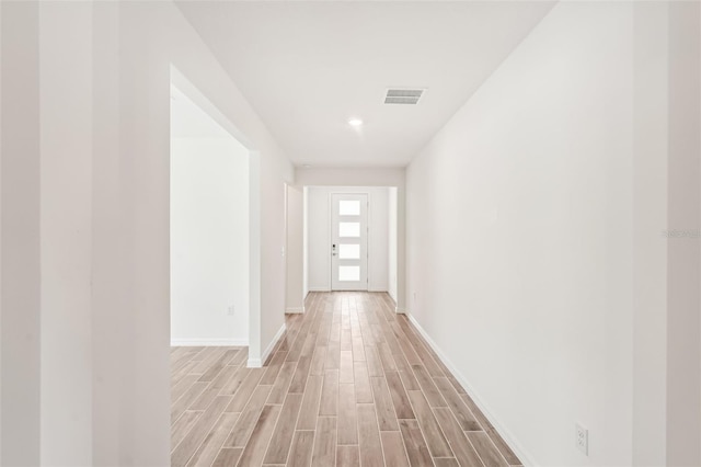 hall featuring light hardwood / wood-style floors