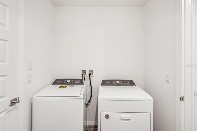 laundry room featuring washer and clothes dryer