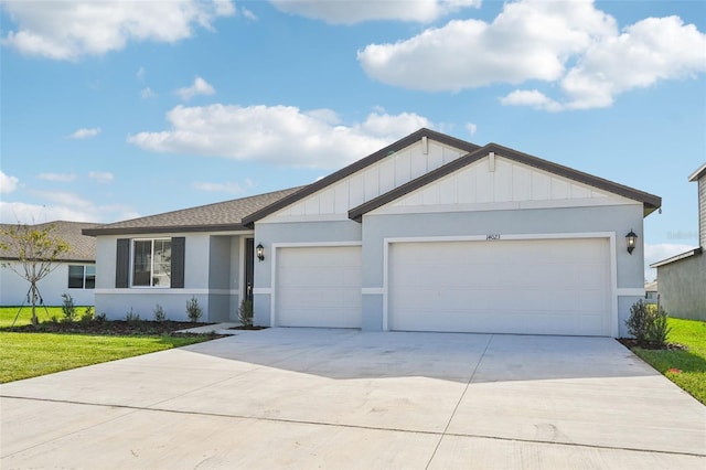 ranch-style home featuring a front yard and a garage