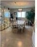 1601 SW 18th St, Boynton Beach, FL 33426 - kitchen with concrete floors