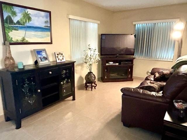 living room featuring tile patterned flooring