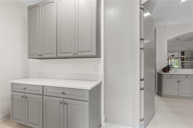 bar featuring gray cabinets