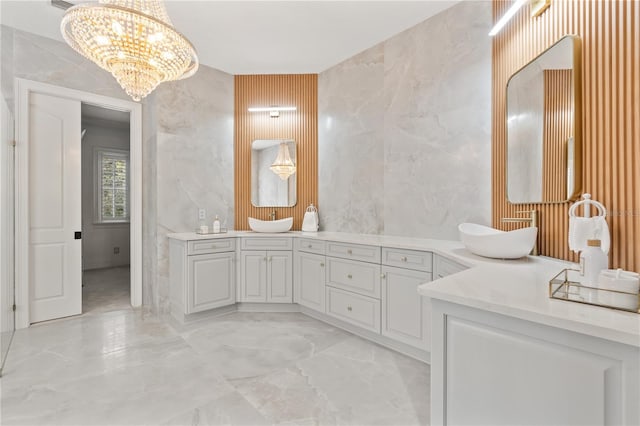 bathroom with vanity and a chandelier