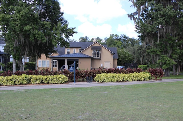 view of front of house with a front yard