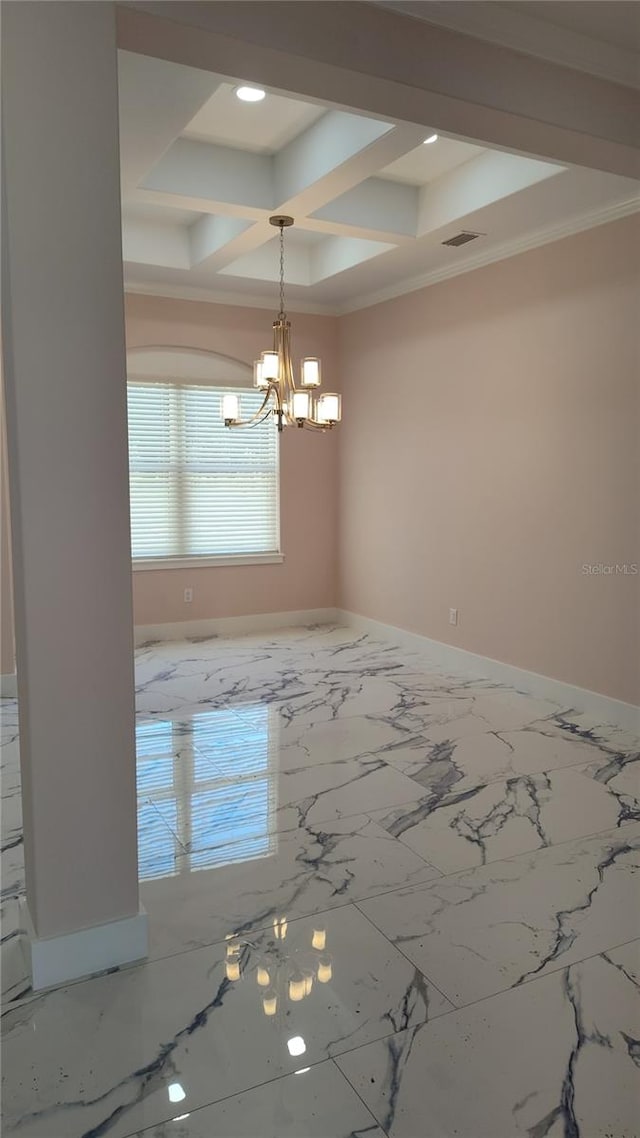 spare room with coffered ceiling, crown molding, beam ceiling, and an inviting chandelier