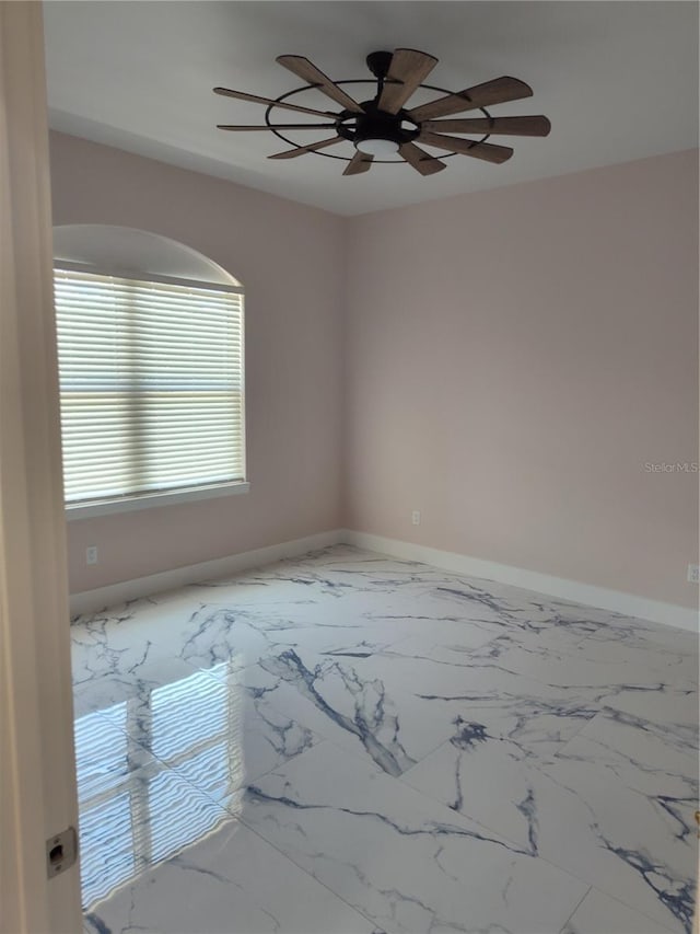 empty room with ceiling fan