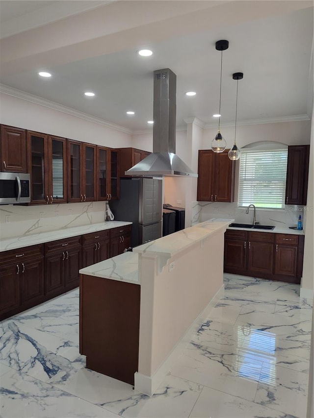 kitchen featuring sink, hanging light fixtures, backsplash, stainless steel appliances, and island range hood