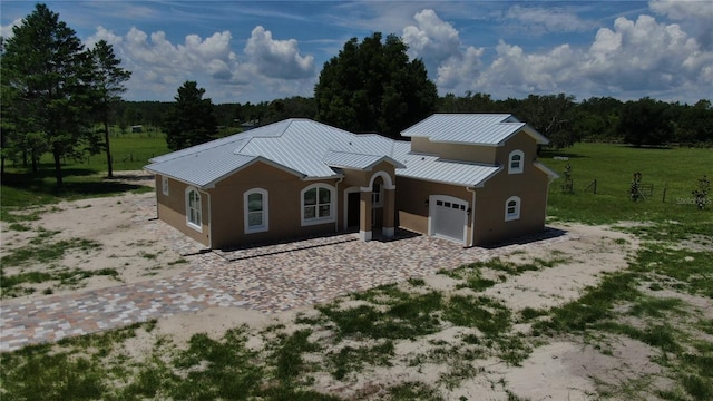 view of front of house with a garage