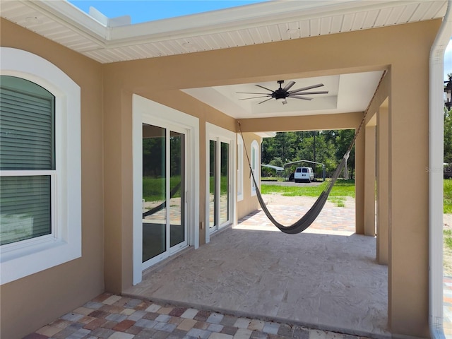 view of patio with ceiling fan