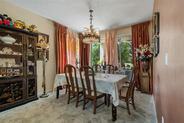 carpeted dining space with a textured ceiling and a chandelier