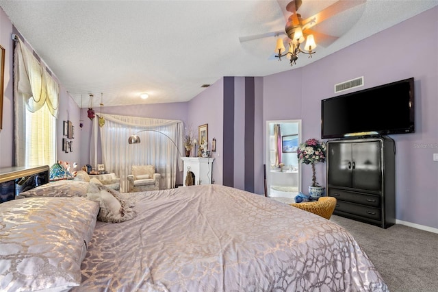 bedroom featuring baseboards, carpet flooring, a textured ceiling, and visible vents