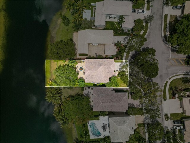 aerial view with a residential view and a water view