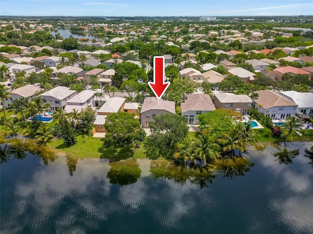 aerial view featuring a residential view and a water view