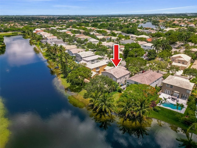 bird's eye view with a residential view and a water view